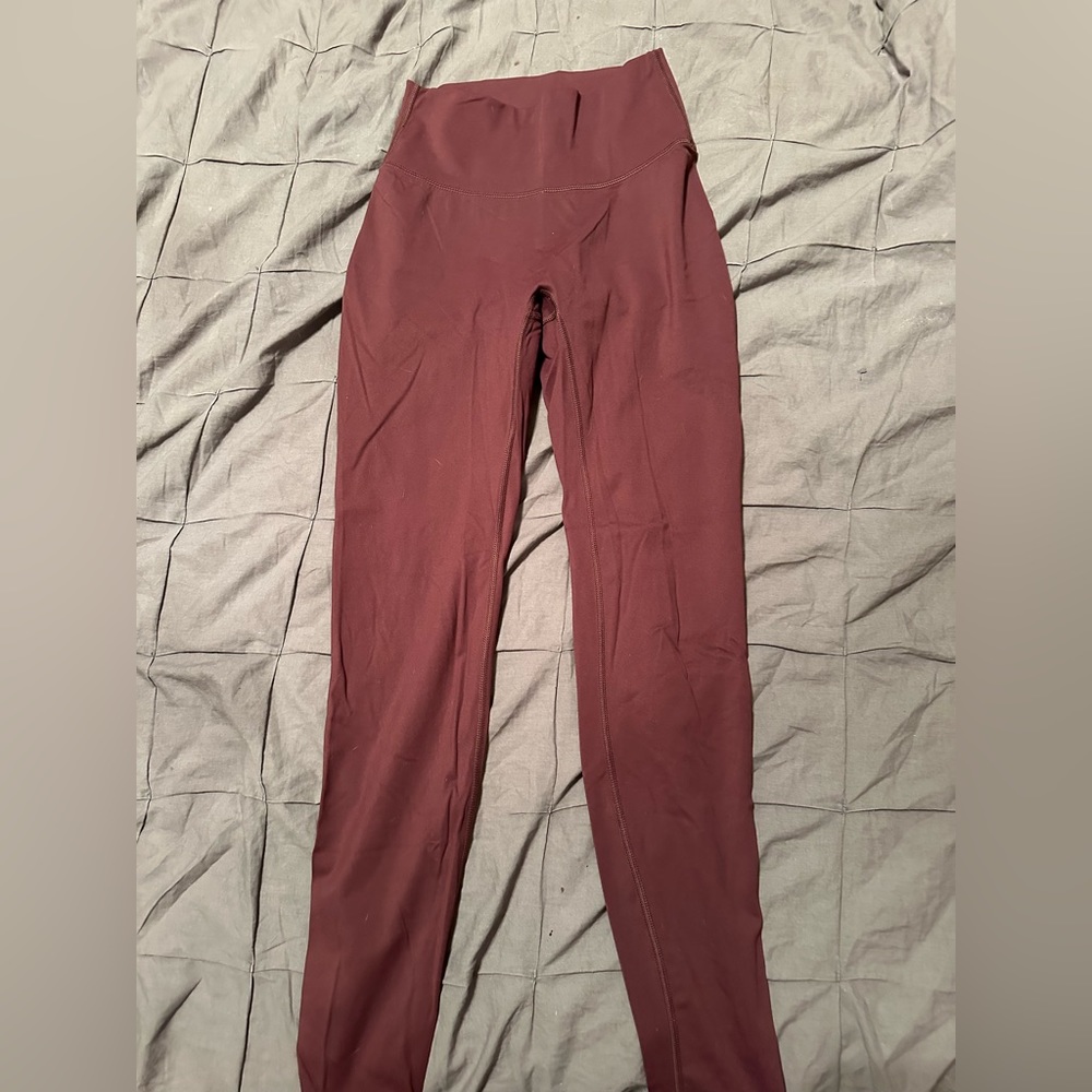 Paragon leggings. Burgundy. Size medium.
